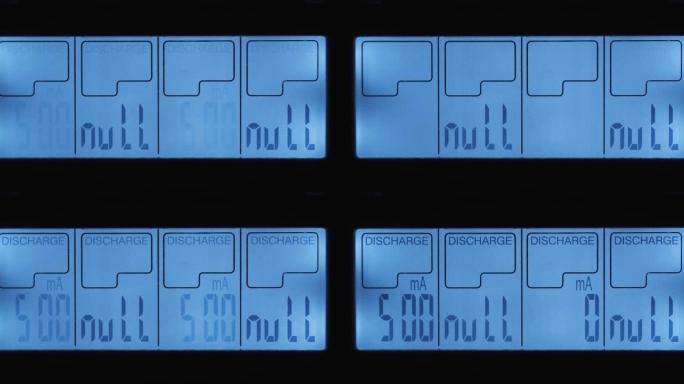 充电器显示特写。闪烁放电符号，电流500毫安