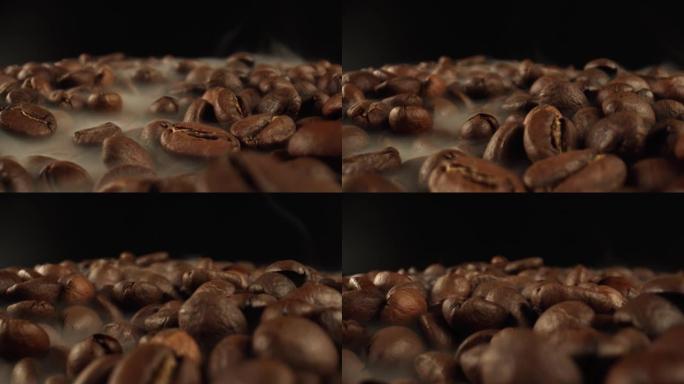 浓浓的白烟在棕色咖啡豆上移动，特写。咖啡树果实中的咖啡因含量高。食物，饮料。