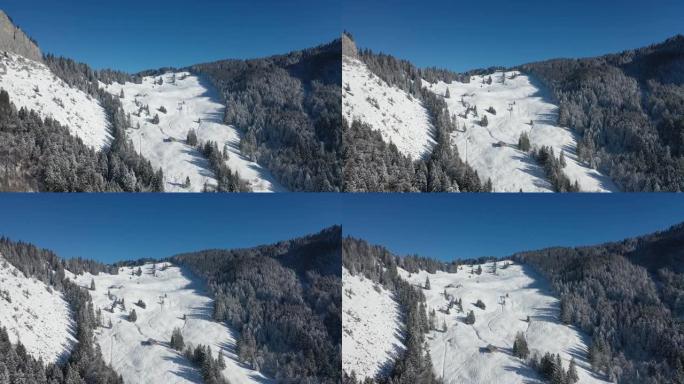 瑞士阿尔卑斯山美丽的冬季仙境的惊人镜头。在卢塞恩州，一架无人驾驶飞机在冰雪覆盖的景观上飞行得非常棒。