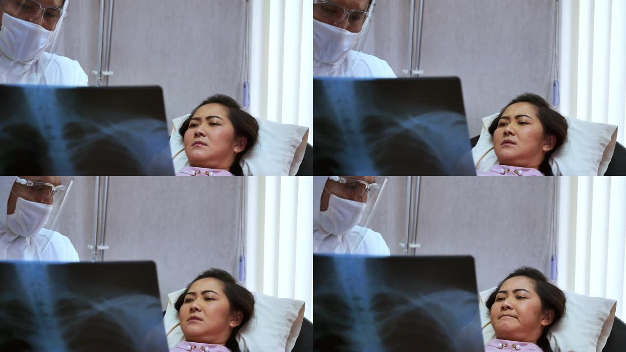 男医生显示x射线扫描他的女病人