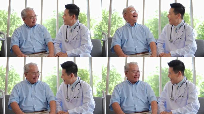 亚洲医生给予同情鼓励退休患者坐在家庭医院的沙发上