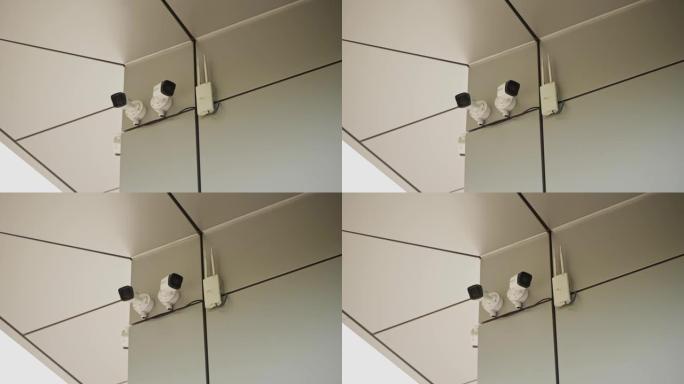 监控摄像头。大楼墙上的监控摄像头。家，办公室保护。
