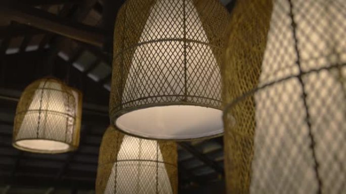 餐厅悬挂的藤灯灯饰特写简约风格