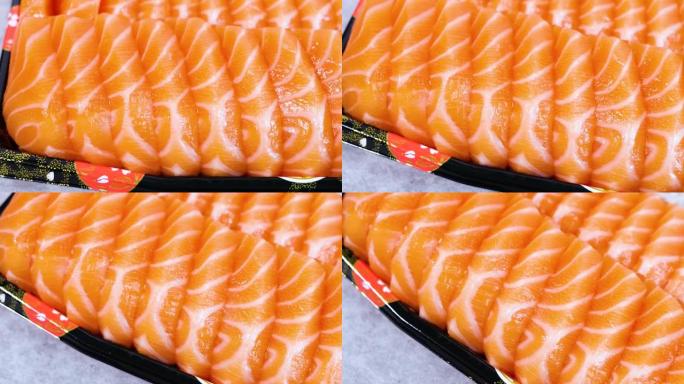 三文鱼生鱼片在菜肴上的近距离旋转运动，日本料理