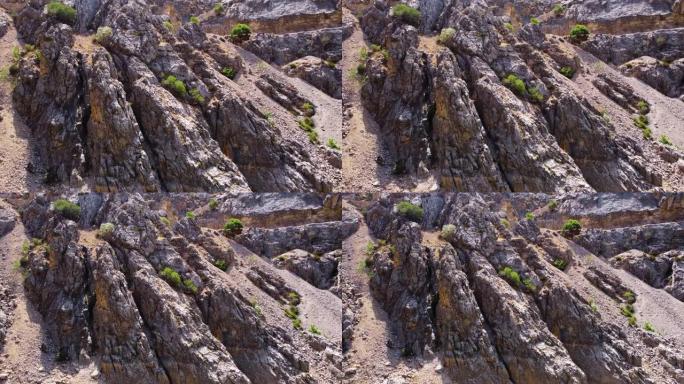 幼发拉底河三角洲巨大陡峭的悬崖峡谷，土耳其戏剧性的地质奇观。美丽的背景和不寻常的风景，鸟瞰4k天线，