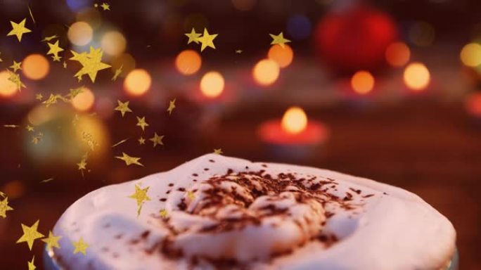 星星在圣诞节热巧克力饮料和蜡烛上飞翔的动画