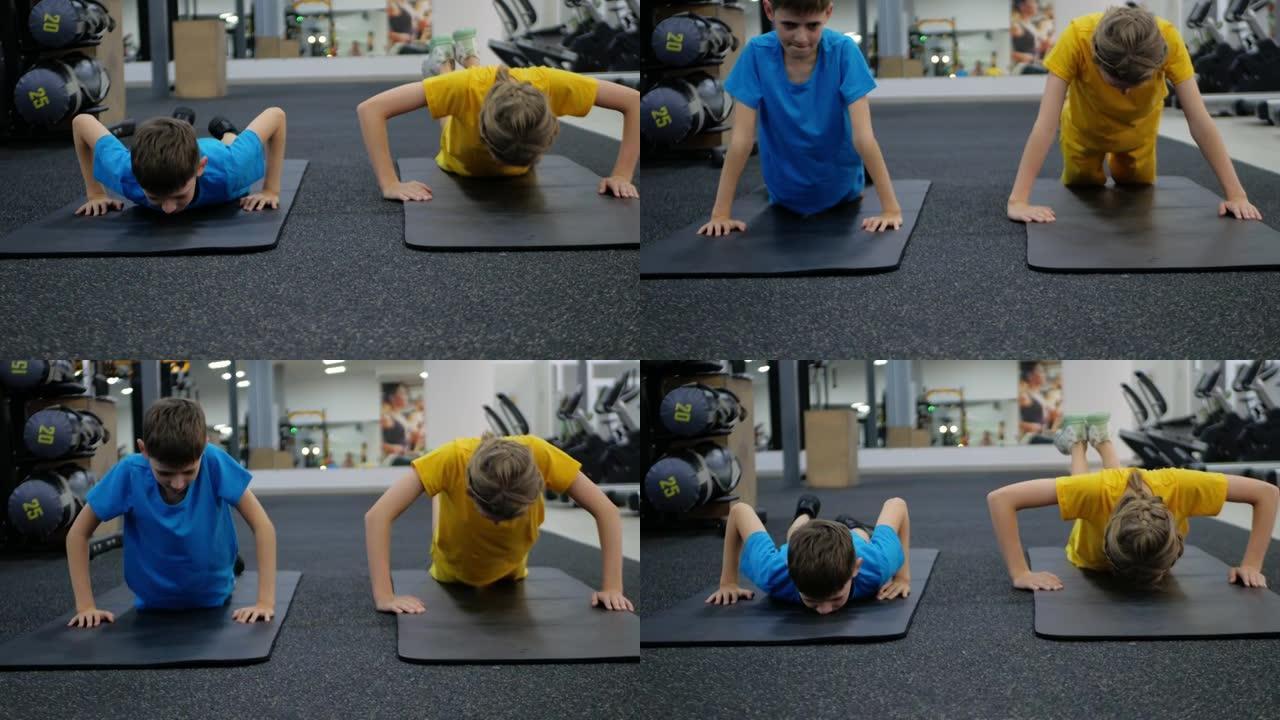 运动，健康的生活方式，概念。小学生从事有氧运动，伸展运动，背部治疗，脊柱弯曲，scaliosis病。