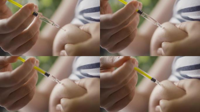 孕妇在胃里给自己打针。女孩注射维生素，关闭注射器视频。
