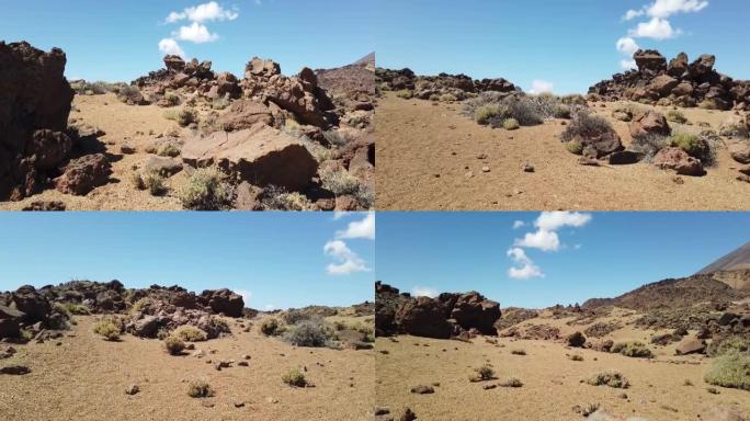 穿越特内里费岛泰德火山山上岩石和沙子之间的沙漠景观