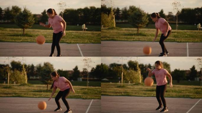 可爱的女孩子弹跳篮球球
