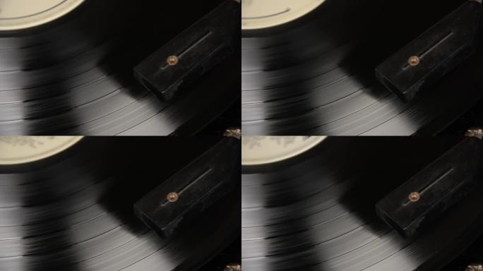 转盘上旋转的黑色乙烯基唱片。模拟音频回放