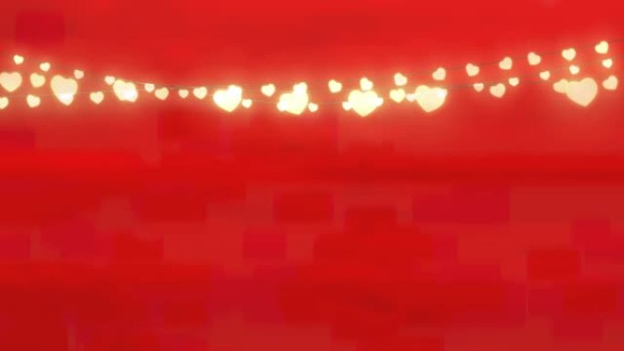 红色背景下悬挂的装饰心形仙女灯的数字动画