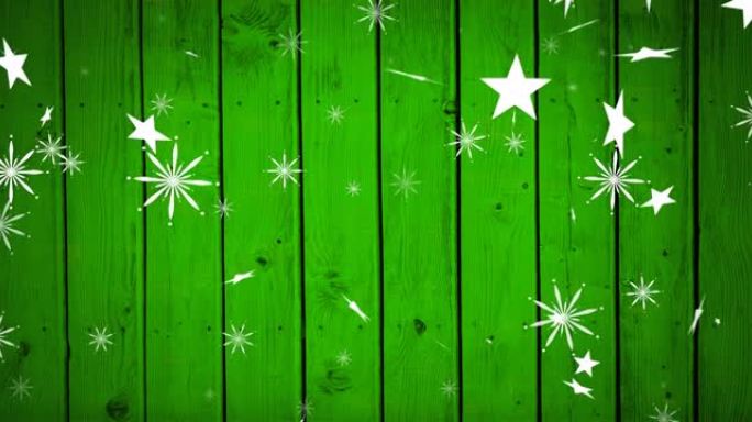 圣诞节星星落在绿色木制背景上的动画