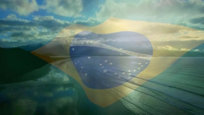 动画的巴西国旗飘扬在海滩景观，多云的蓝天和大海
