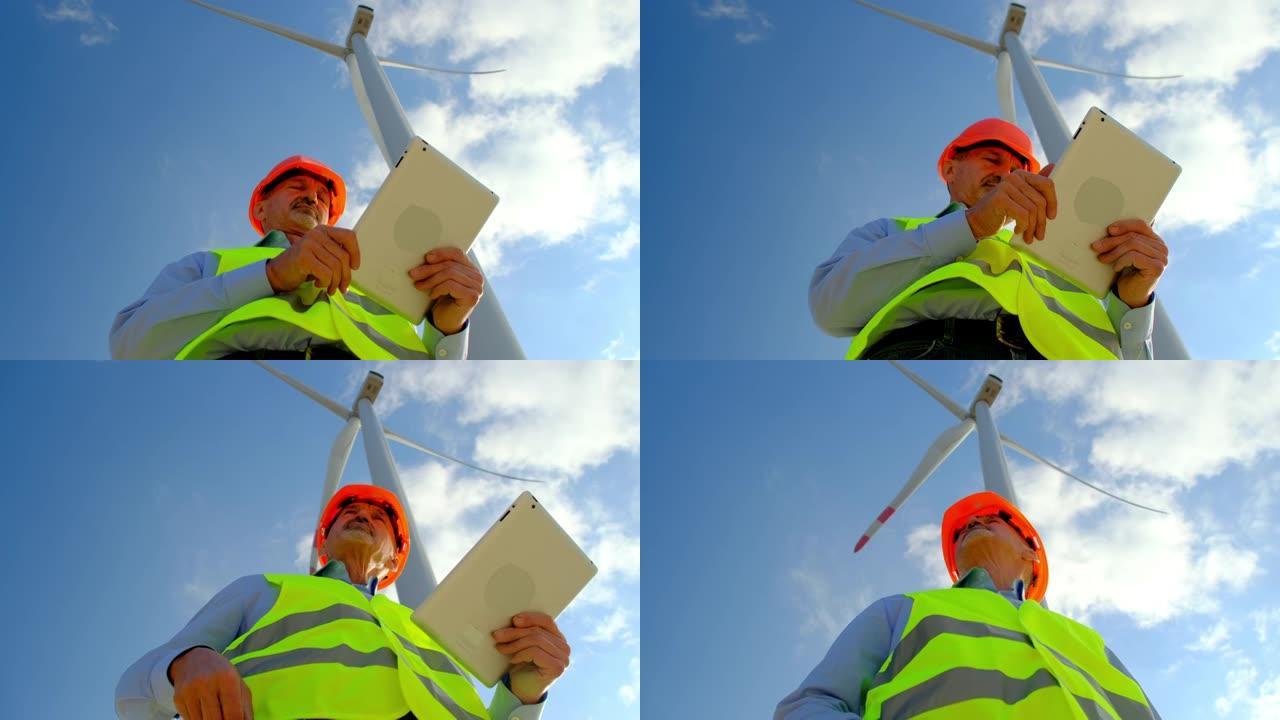工程师检查风车产生的能量