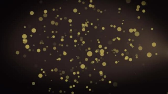 黑色背景上的金色圆点和流星掉落的动画