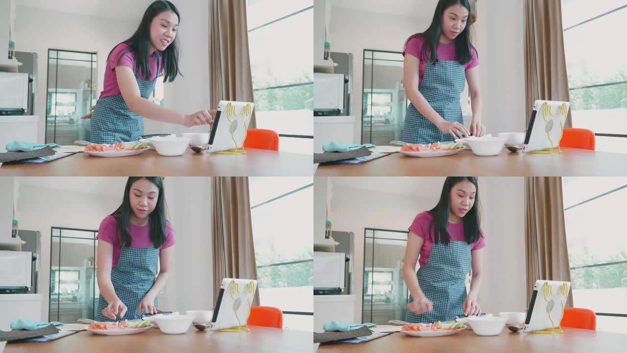东南亚女人在家做寿司卷。
