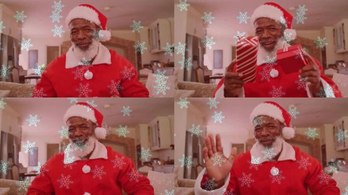 穿着圣诞老人服装并进行视频通话的微笑男子上的雪的动画