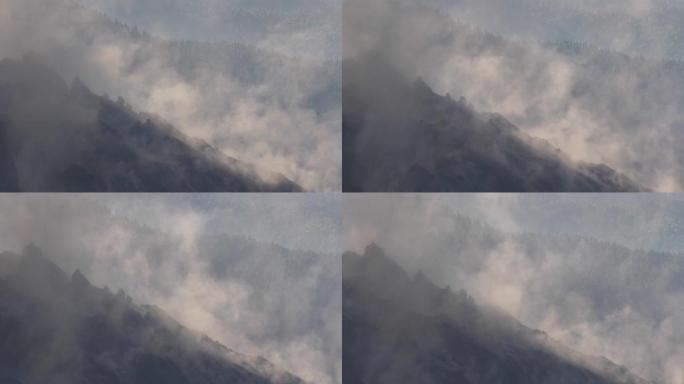 火山烟雾沿着燃烧的斜坡下降