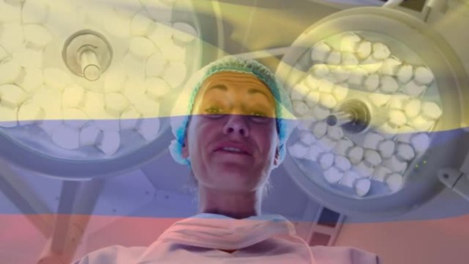 喀麦隆旗帜在手术室女外科医生上方飘扬的动画
