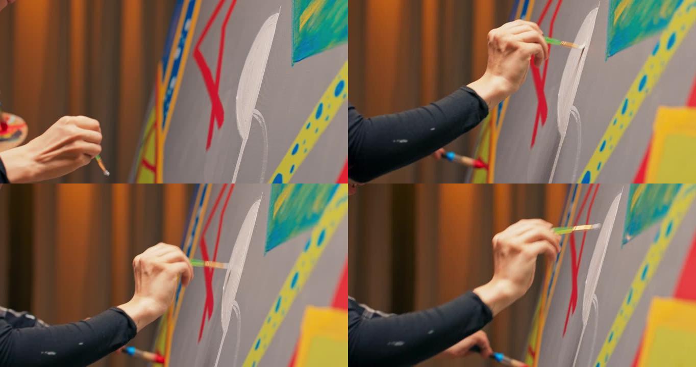 画家正站在画布上靠近画架，看着精致的连续线条，她正在用薄而精确的画笔绘制，使用白色油漆，创作构图，作