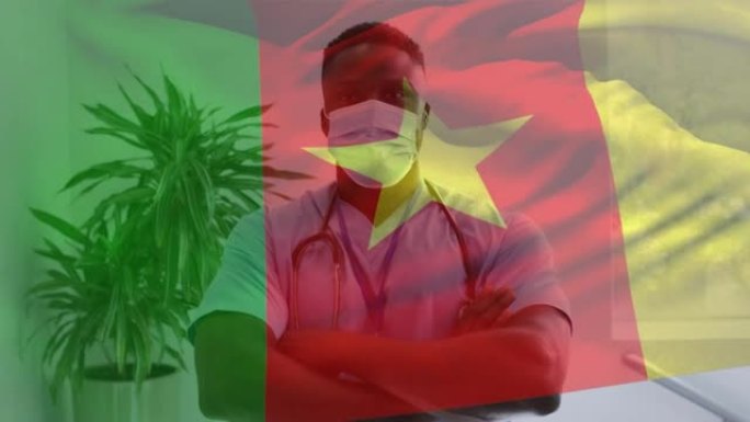 喀麦隆国旗挥舞着戴着口罩的医生的动画