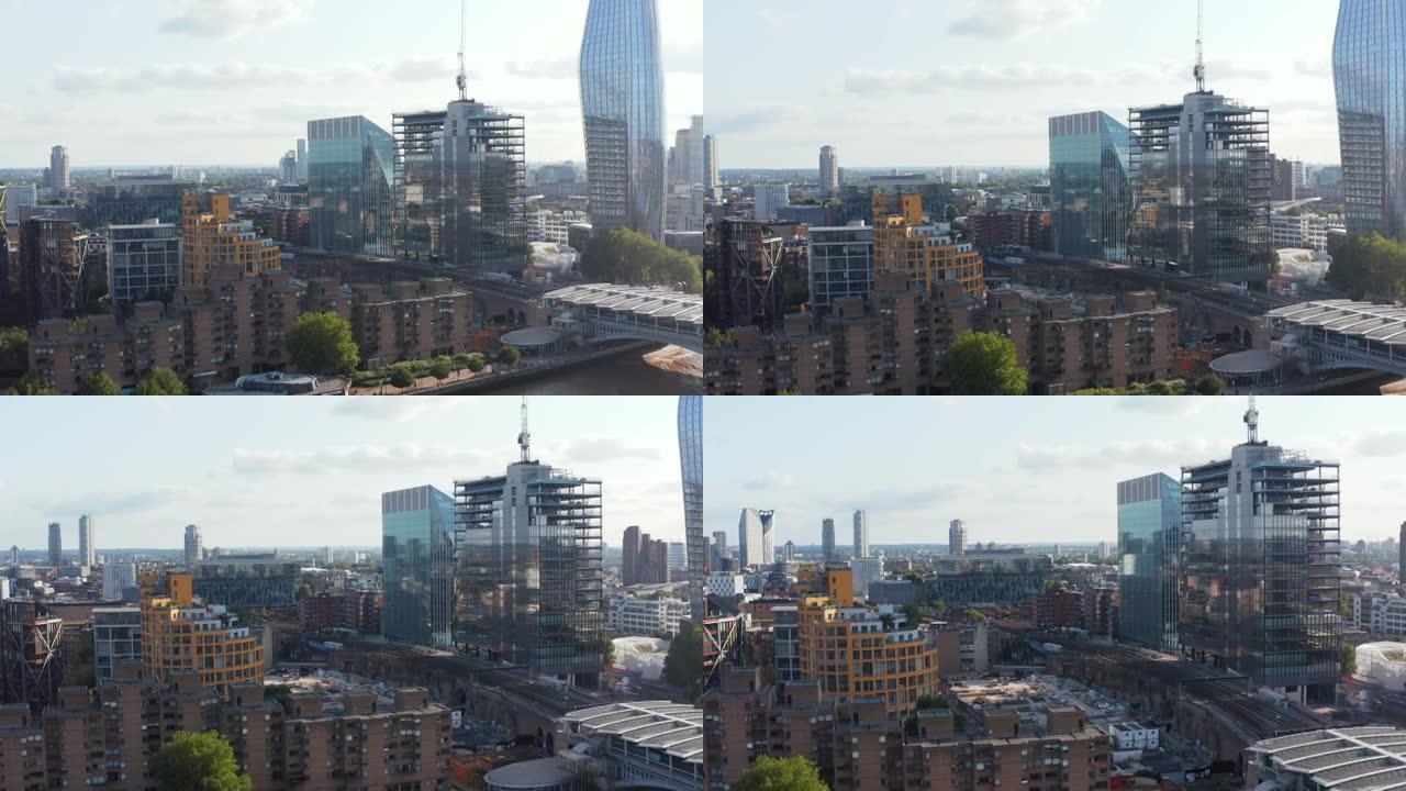 泰晤士河南岸建筑物的全景曲线拍摄。建造带有光泽玻璃立面的新型现代高层建筑。英国伦敦