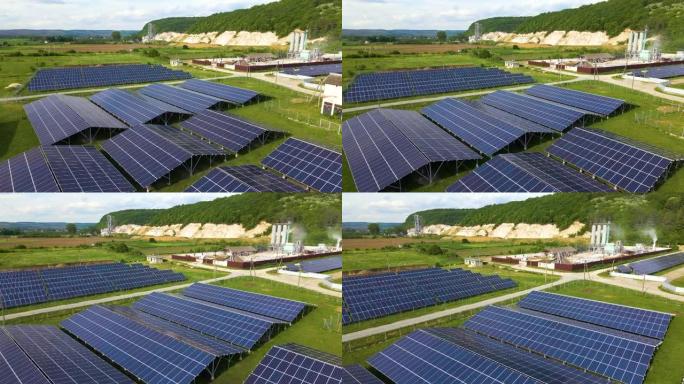 发电厂的鸟瞰图，带有成排的太阳能光伏板，用于在工业区产生清洁的生态电能。零排放概念的可再生电力。