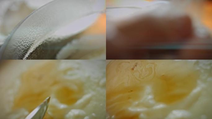 在冰淇淋配料中加入一汤匙香草香精。4k宏视频