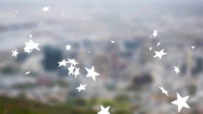 多星图标落在模糊的城市景观的鸟瞰图上