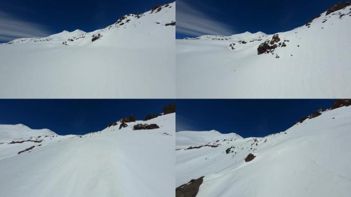 空中fpv无人机视图雪山埃尔布鲁斯峰电影风景景观与滑雪跑道