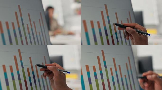 电脑显示器特写条形图显示黑皮肤男人手握笔触屏用它检查图水平他们的正确性高度统计局营销财务分析