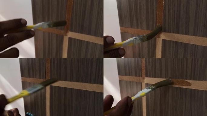 一个巴西男子画门细节的视频。