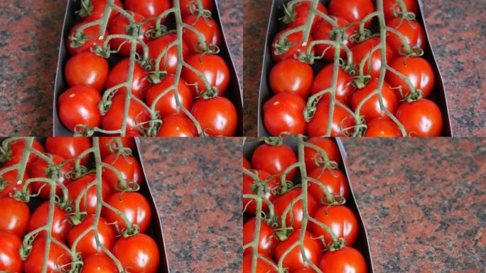房子厨房桌子上包装的新鲜买的樱桃西红柿