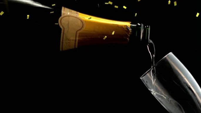 金色五彩纸屑在香槟上的动画在黑色背景上倒入玻璃中