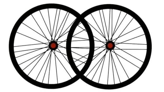 两个自行车车轮在白色背景上孤立地旋转。