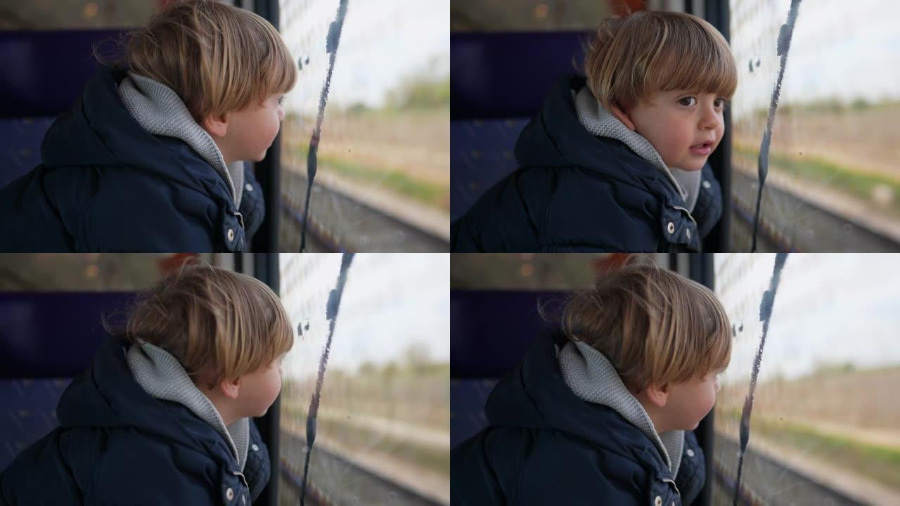 小男孩乘火车旅行，看着窗外做白日梦