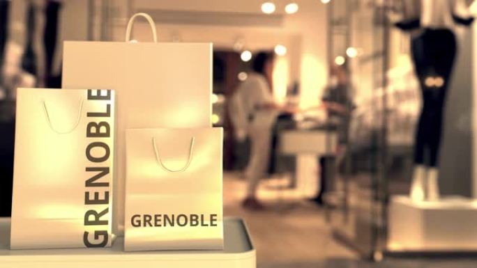 带有格勒诺布尔标题的纸质购物袋，对着模糊的商店入口。法国零售相关概念3D动画
