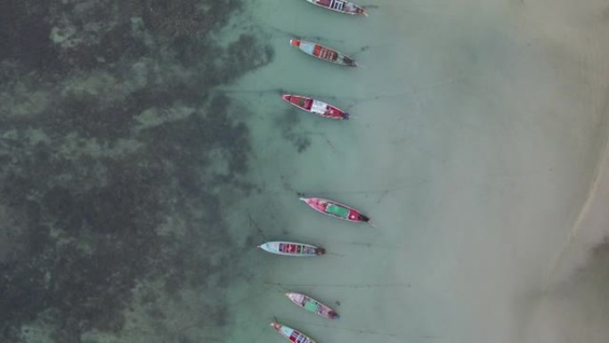 泰国利培岛岛上船只的透明海洋鸟瞰图
