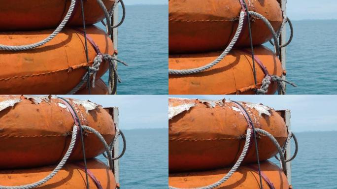 橙色小型刚性救生艇或救生筏，用于在船上发生灾难时紧急疏散