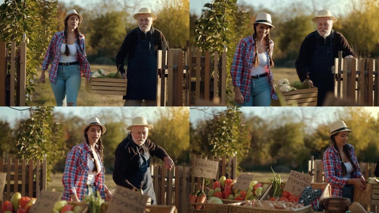 农民老人和他成年的女儿背着一个装有不同新鲜蔬菜的木箱，放在蔬菜当地市场的柜台上。购物和消费主义概念有