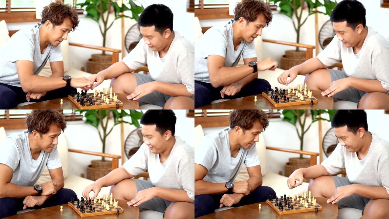 父子在家一起下棋陪伴亲子下棋父亲