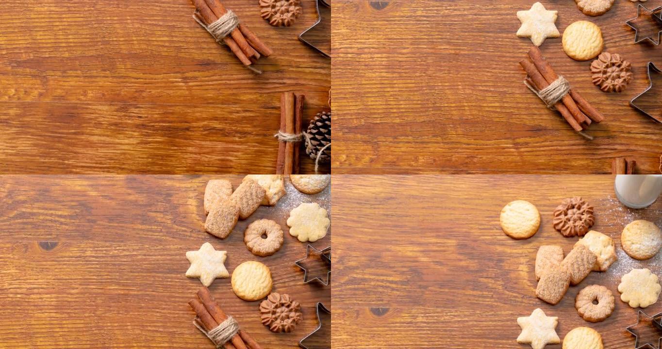 木制背景上的肉桂、饼干和松果圣诞装饰品的组成