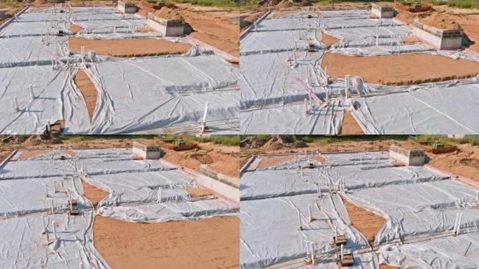 塑料水管工业管道铺设在施工现场的砂基上