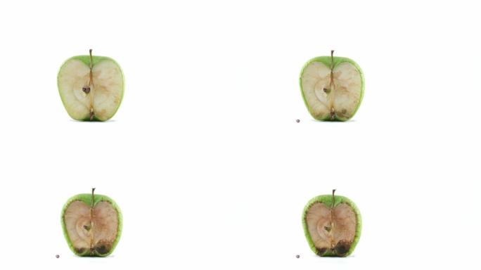 绿色和半苹果在白色背景的延时镜头上腐烂
