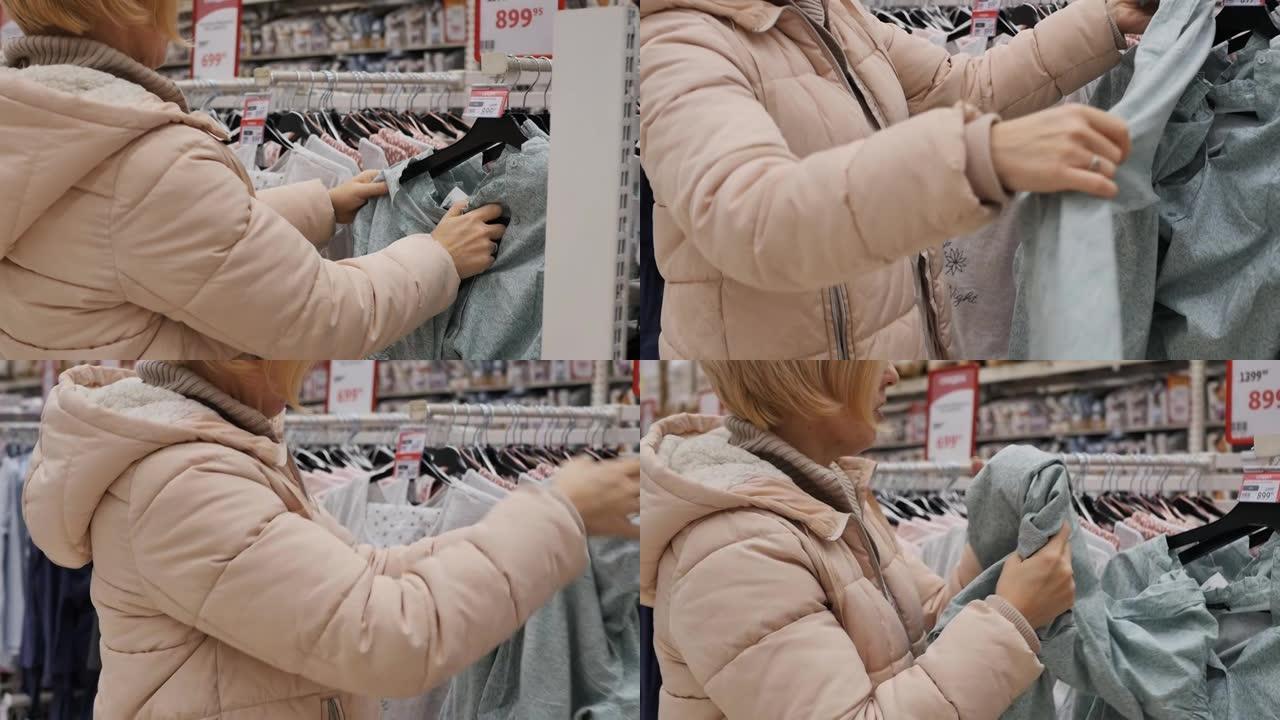 在超市穿着棉袄的白人年轻女子选择睡衣