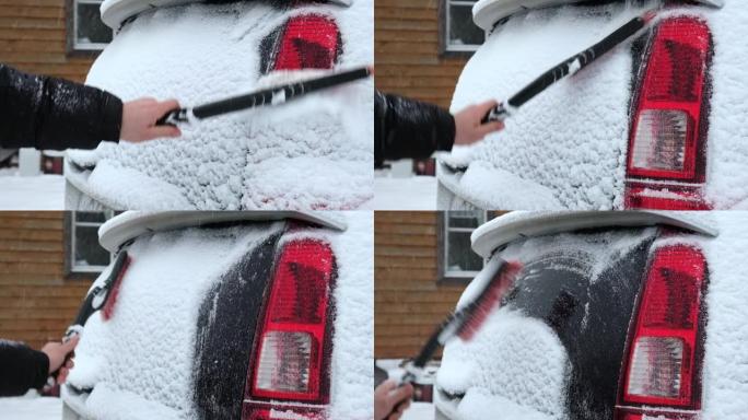 暴风雪暴风雪后，人从车窗上刷新鲜的雪。冬季寒冷天气车主的早晨常规困难。车窗清洁。冬季。白雪。车辆保养