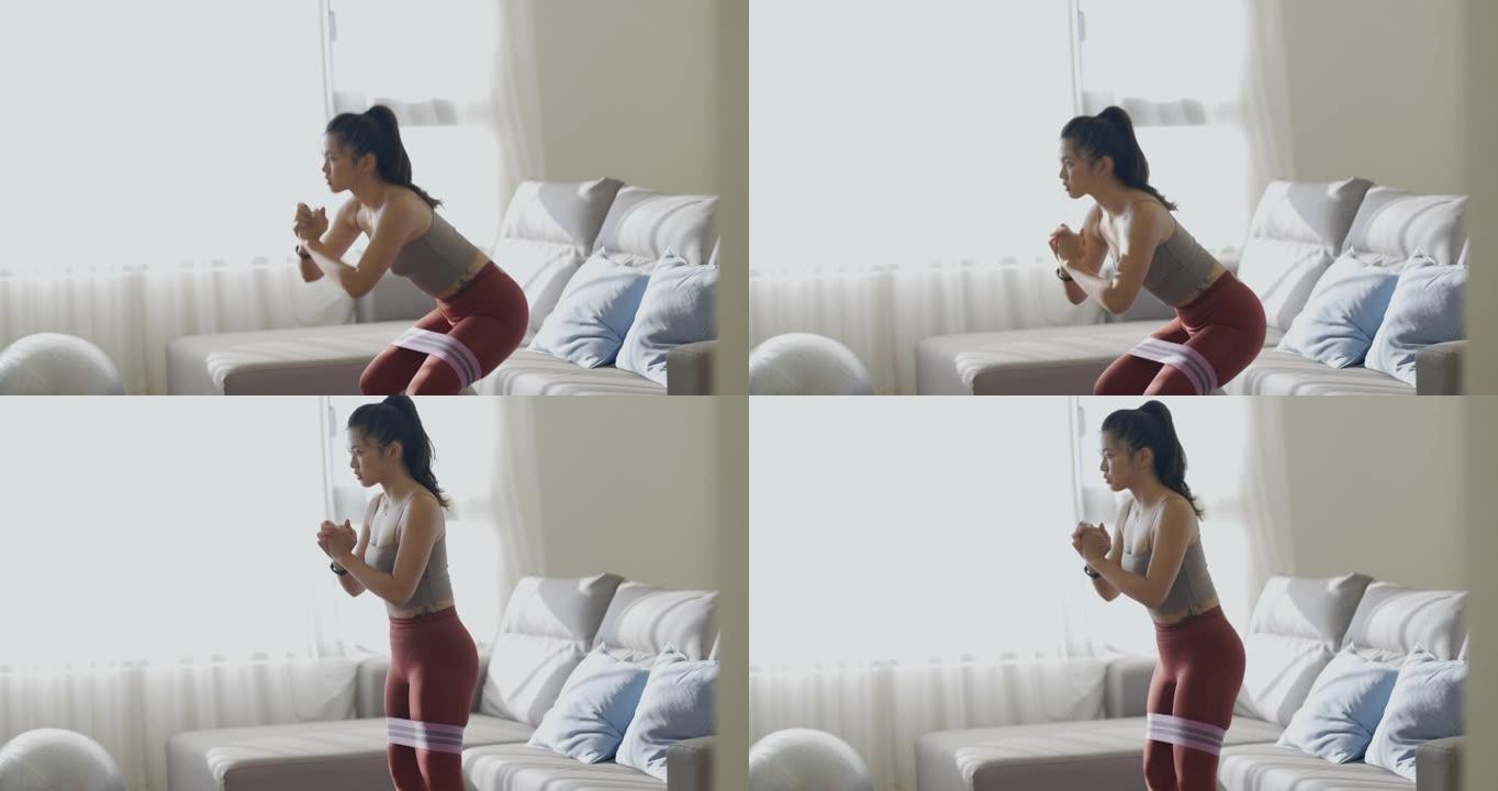 亚洲妇女在家锻炼练臀翘臀人物