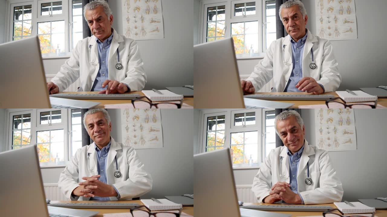 医生办公室办公桌上穿着白大褂的成熟男性全科医生肖像