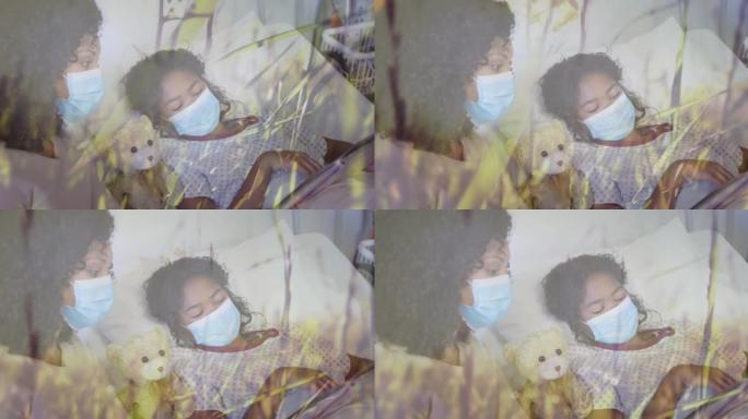 戴着口罩的混血儿母亲和女儿躺在医院的草的动画